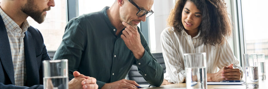 Focused,Doubtful,Mature,Businessman,Reading,Contract,Document,Thinking,Considering,Risks